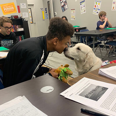 Broach school Ponte Vedra Service Dog Interacting with a Student in the Classroom